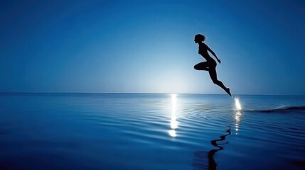 Silhouette of a Person Jumping Over Water with Calm Blue Tones and Reflections in a Serene Atmosphere at Dusk