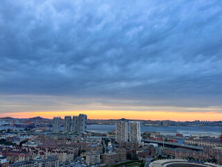 San Diego Skyline at Sunset with Cloud-Covered Sky and Bay View © TruongThi