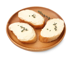 Slices of baguette with butter and thyme isolated on white