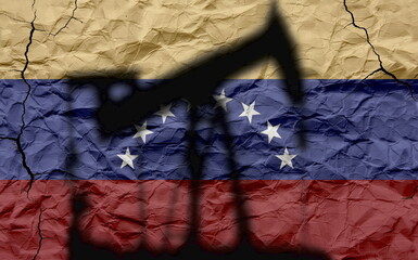 Oil pump silhouette in front of a textured and cracked Venezuelan flag. Venezuelan oil concept and...