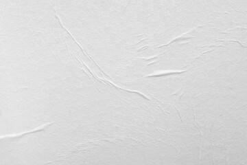 White paper texture with folds as an abstract background
