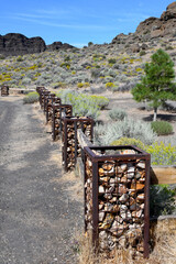 Area Rocks Serve as Filler For Fence Posts