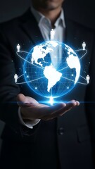 Person holding a glowing digital globe with interconnected human