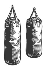 Pair of classic hanging punching bags for boxing training in detailed black and white vector illustration.