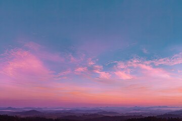 Pink and blue sunset over mountain range, soft light and tranquil atmosphere