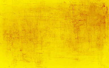 Obraz premium wallpaper in yellow color with uneven rough run down wall. 