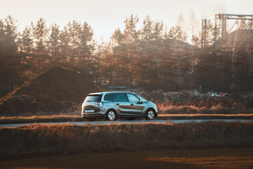Fototapeta premium Comfortable passenger vehicle on city road