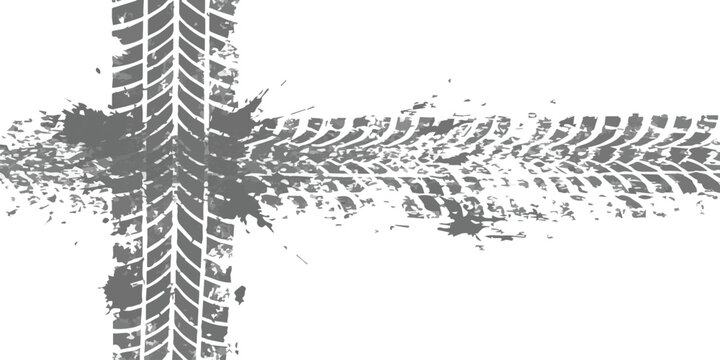 Grungy tire tracks leaving a path with muddy splatters on a white background