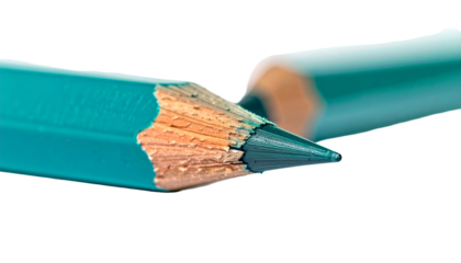 Macro shot of two sharpened turquoise colored drawing tools with wood exposed at tips