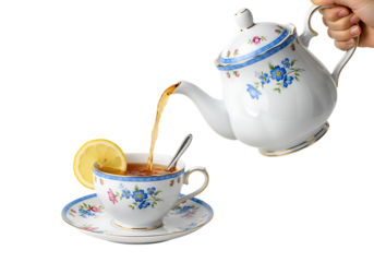 Hand Pouring Tea from a Floral Porcelain Teapot into a Matching Teacup with Lemon Slice, Elegant Afternoon Tea Service Isolated on White