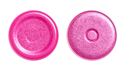 Two close-up views of small, round, pink containers against a black backdrop