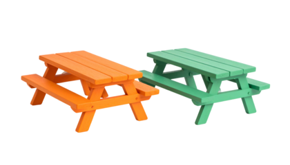 Two brightly colored miniature picnic tables, orange and green, isolated on a black background
