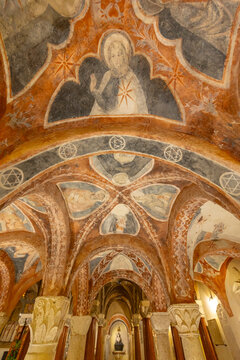 Crypt vaulted ceiling featuring ancient frescoes in Ascoli Piceno, Italy
