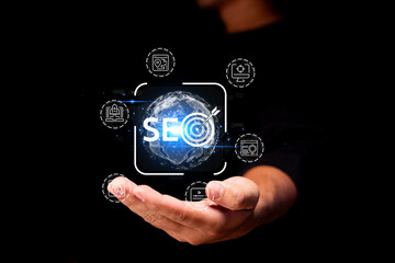 A hand reaches out towards a glowing globe with SEO symbols, representing digital marketing and global connectivity.