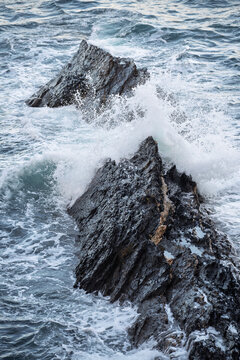Crashing Waves on Rocky Shore of Viveiro Ria in Spain