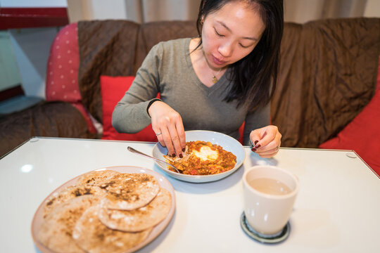 Enjoying a meal with homemade pita bread at home