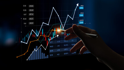 A close-up view of a hand interacting with a digital stock market chart displaying various data visualizations, indicating trends and investment opportunities in finance. Scalp