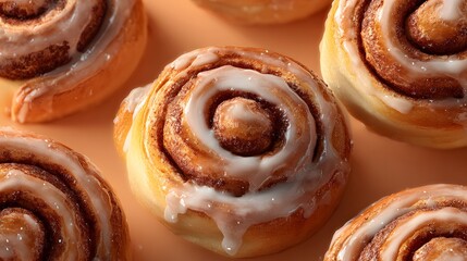 Fresh cinnamon rolls with sugar icing glaze, sweet pastry buns close up background