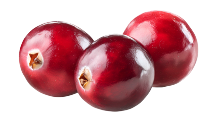 Close-up of three ripe, glossy red berries arranged on a black background