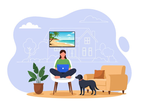 Woman sitting crosslegged on stool working on laptop with dog and tv showing beach scene