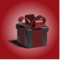 Black gift box with red bow on gradient red background with copy space