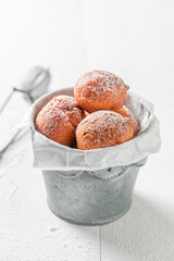 Fresh and sweet mini doughnuts for Fat Thursday in Poland.