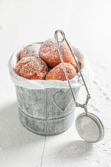 Homemade and fresh mini doughnuts ready to eat.