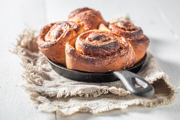 Delicious cinnamon buns made of butter. Scandinavian dessert.