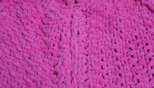 Flauschige Strickjacke Grobstrickmuster in rosa zur Hintergrund und Textur Nutzung