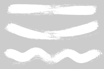 White grunge brush strokes. Vector chalk grunge hand drawn isolated on black background. set of hand drawn brush strokes.