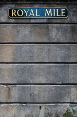 Edinburgh, Scotland, Uk: sign of The Royal Mile, a series of streets with shops, restaurants and visitor attractions running between Edinburgh Castle and Holyrood Palace and forming the main t