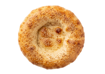 sesame bagel on white background with golden crust