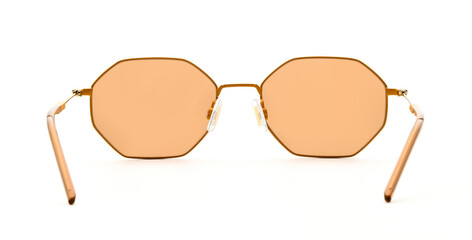 Sunglasses back view isolated on white background. Eyeglasses inside view Hexagonal frame with gold colored uv lens against sunlight. Glasses rear view modern style for design template