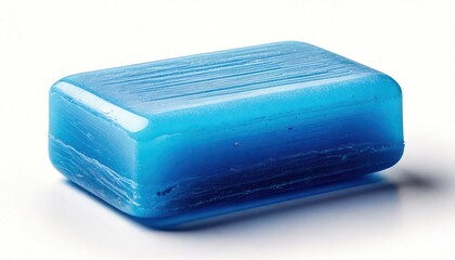 Close-up of a translucent blue soap bar on a white surface.