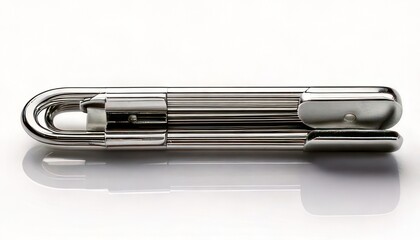 Close-up of a silver metal object with a curved design on a white surface.