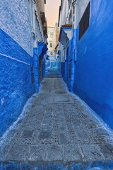 Narrow, stepped, pedestrian passageway linking the different levels of the medina, painted as is customary in shades of blue. Chefchaouen-Morocco-027