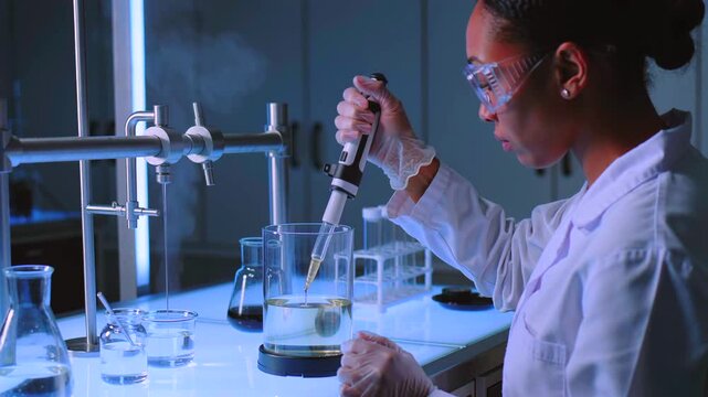 Careful handling of liquids, Executing detailed laboratory procedures to ensure precise outcomes, Performing careful scientific liquid manipulation and transfer for reliable experimental results