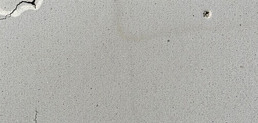 Rough concrete surface with subtle variations in tone and depth,  stone,  surface