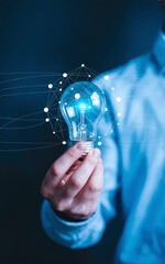Innovative Business Idea and Creative Brainstorming Concept with Businessman Holding Glowing Light Bulb Connected to Global Digital Network Mesh 