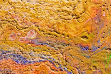 Macro photo of cracked paint texture on abstract impressionist background &mdash; vibrant warm and cool tones. Professional art photography for design and decoration
