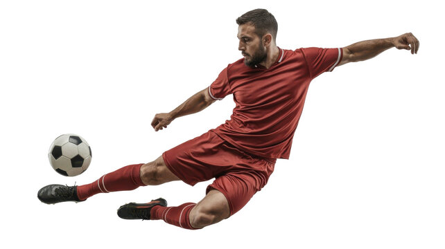 Soccer player kicking the ball in mid-air