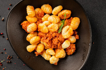 Gnocchi sauce tuna fish natural food main course ingredient appetizer fresh tasty table setting gourmet food background on the table rustic food top view copy space