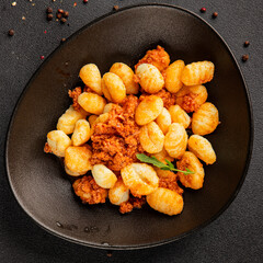 Gnocchi sauce tuna fish natural food main course ingredient appetizer fresh tasty table setting gourmet food background on the table rustic food top view copy space