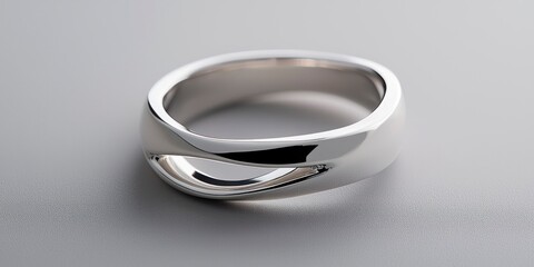 Detailed shot of a silver spinner and fidget ring with sleek surface  