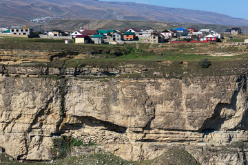 Houses of the village of Khunzakh above the edge of Tsolotlin canyon in Dagestan