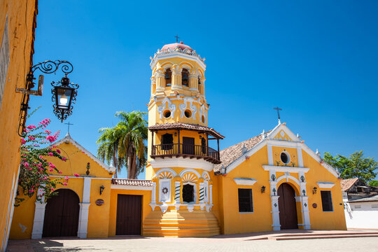 The beautiful historic Church of Santa Barbara built in 1613 with a balcony on its bell tower at the colonial Heritage Town of Santa Cruz de Mompox in Colombia.