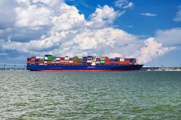 Cargo vessel with shipping containers representing global trade and maritime transport