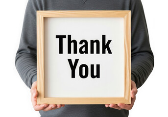 Person holding a wooden framed sign with thank you