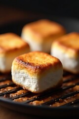 Grilled marshmallows, close-up view Charred edges, caramelized sugar , golden, sugar