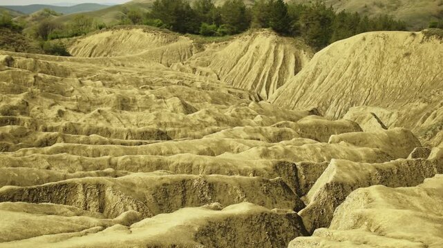 Slow Pan Over an Alien-Like Mud Volcano Landscape in Romania